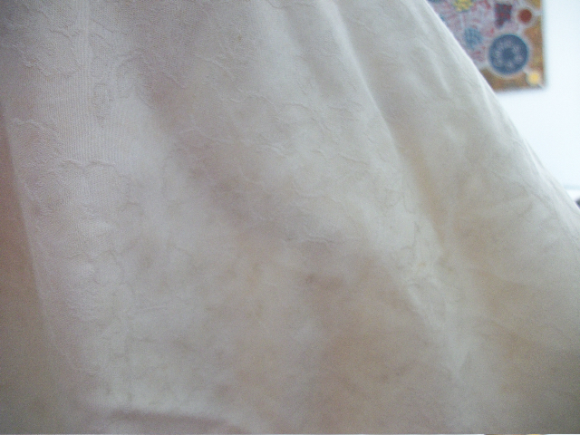 Mildew on damask cloth